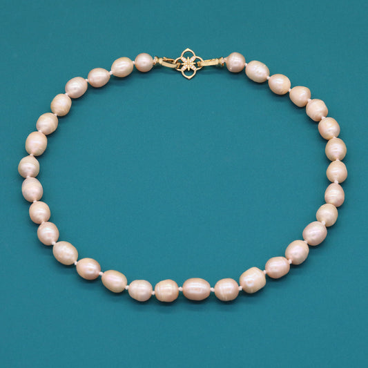 A beautiful 100% handmade, freshwater pearl necklace with golden flower buckle, 10mm, perfect for bridal jewelry, Mother's Day, birthday gifts, parties, giving the perfect ideal gift choice