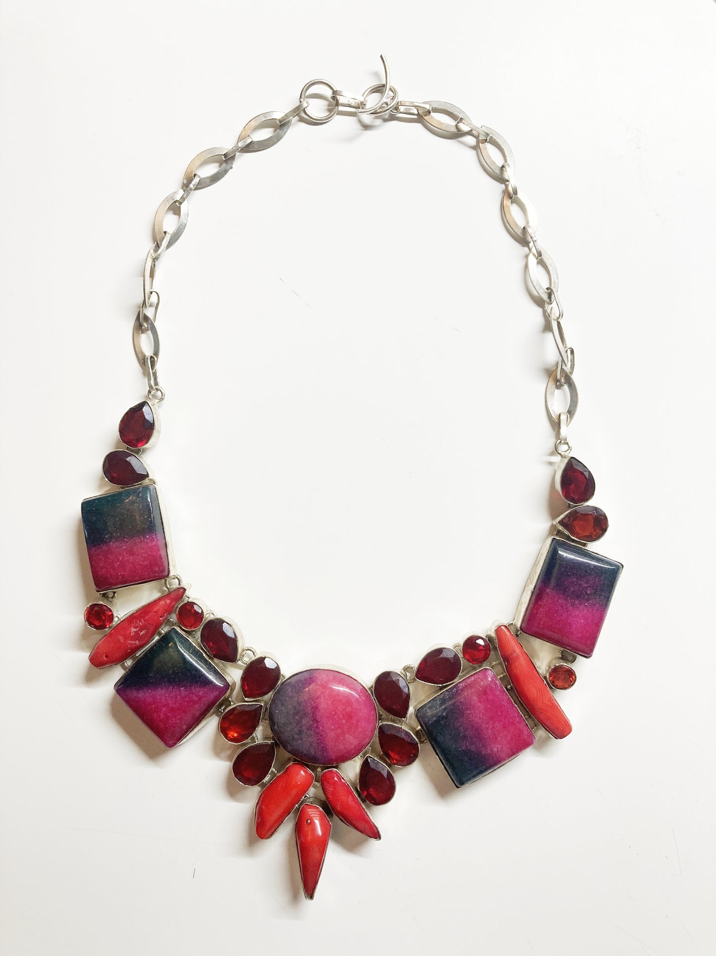 Sterling silver statement necklace in multi shades of red gemstones