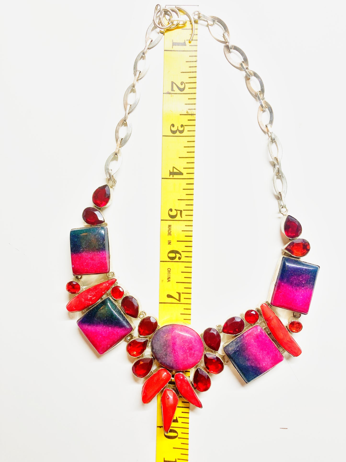 Sterling silver statement necklace in multi shades of red gemstones