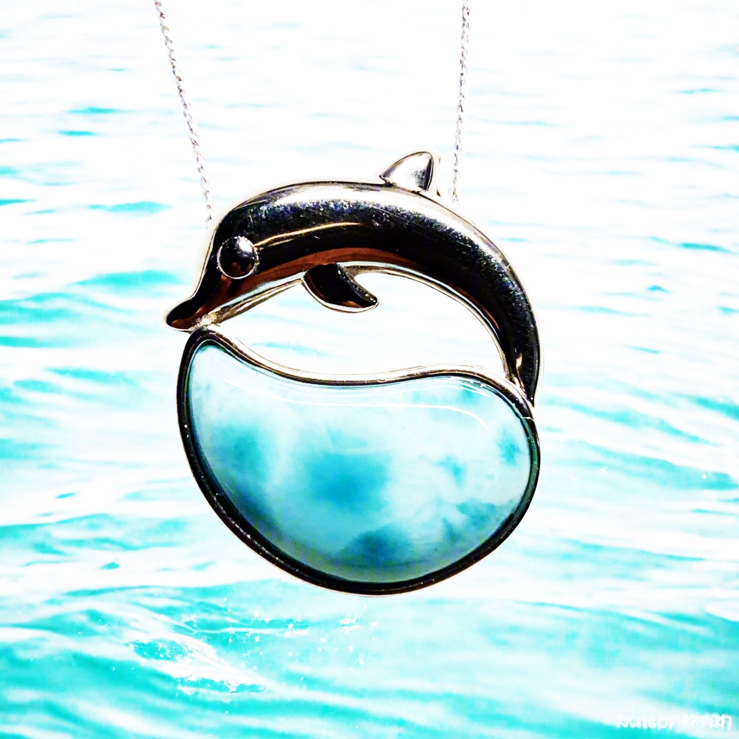 Doulphin on a wave pendant larimar